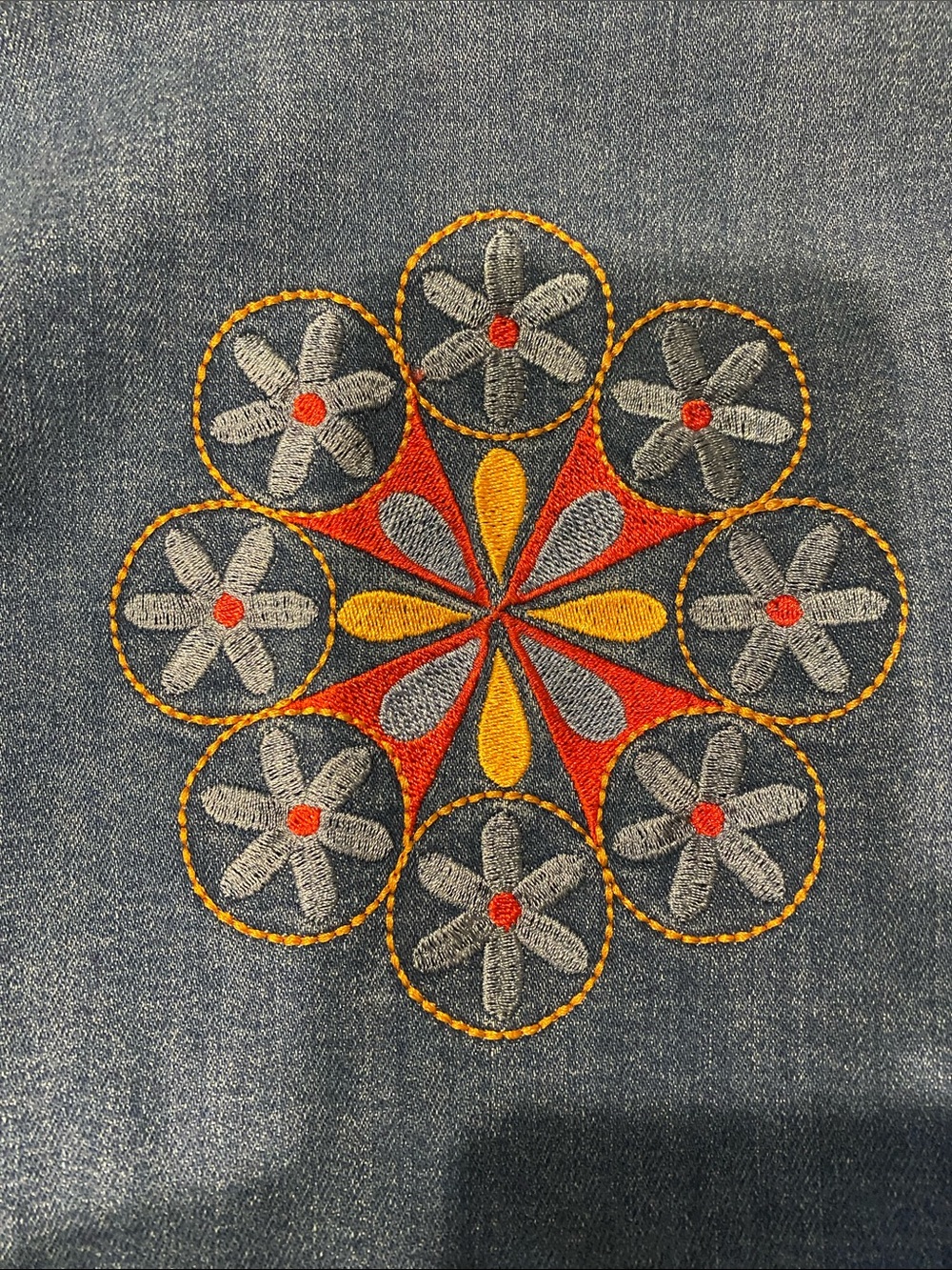 The Hippie Shake Embroidered Denim Vest in Blue with Red, Yellow, Cream Accents - Picture 4 of 5